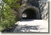 The tunnel on the West side of Logan Pass - it has two windows in the side so you can view the mountains.