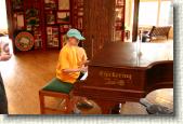 Stephanie plays the piano in the East Glacier Lodge. (The sign says Please no Chopsticks or Heart and Soul) Stephanie played Fur Elise.