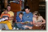 Story time! Duncan, Bil, Zimm, Tim and Rosalyn hear the tale of Whitefish Will.